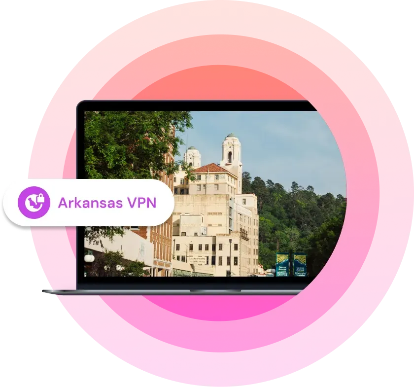 Illustration showing a laptop with a picture of an Arkansas city on it with the text "Arkansas VPN" next to it