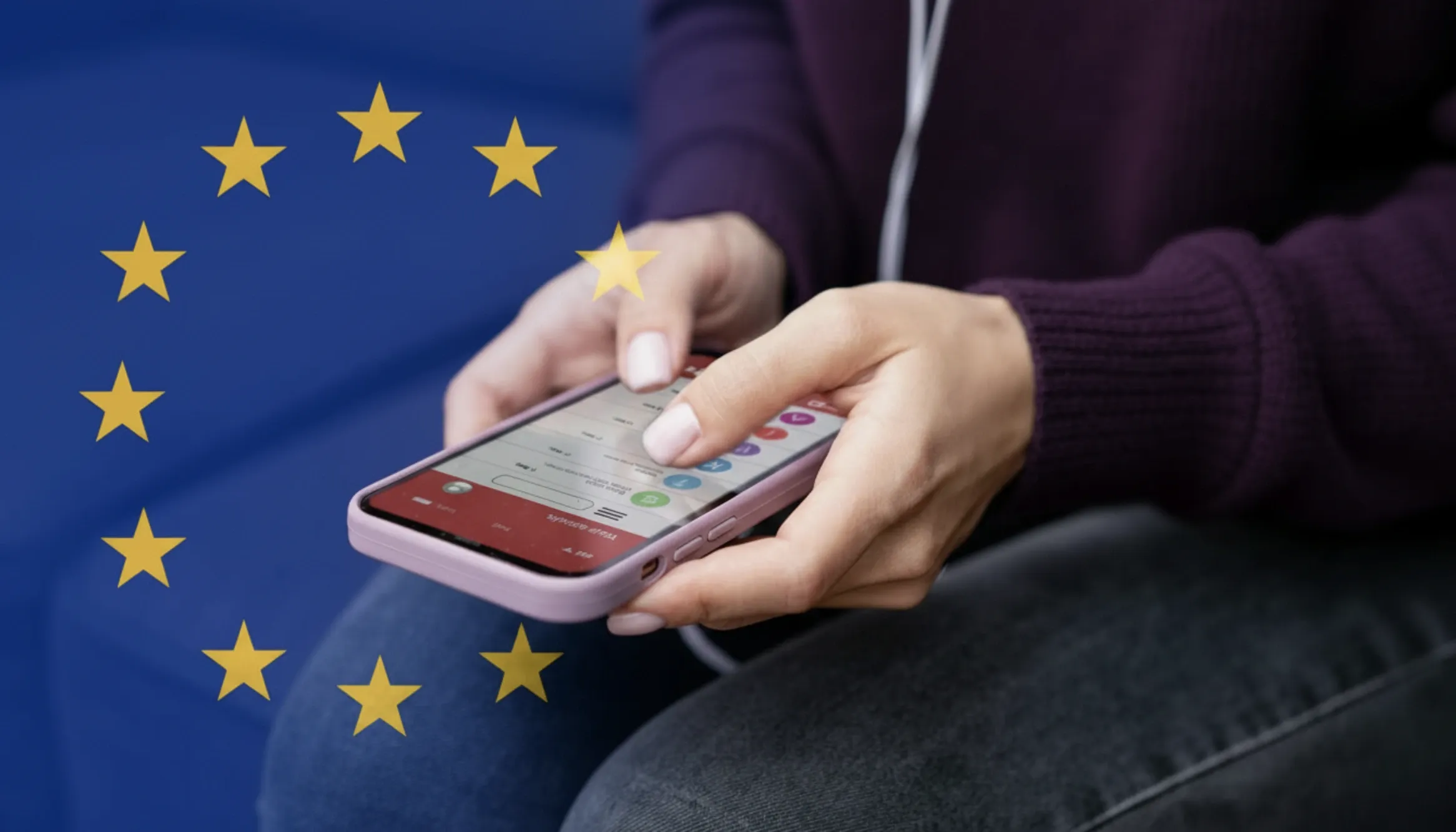 Person using a smartphone in front of the European Union flag, symbolizing EU digital regulation, online messaging oversight, and proposed chat control and privacy laws.