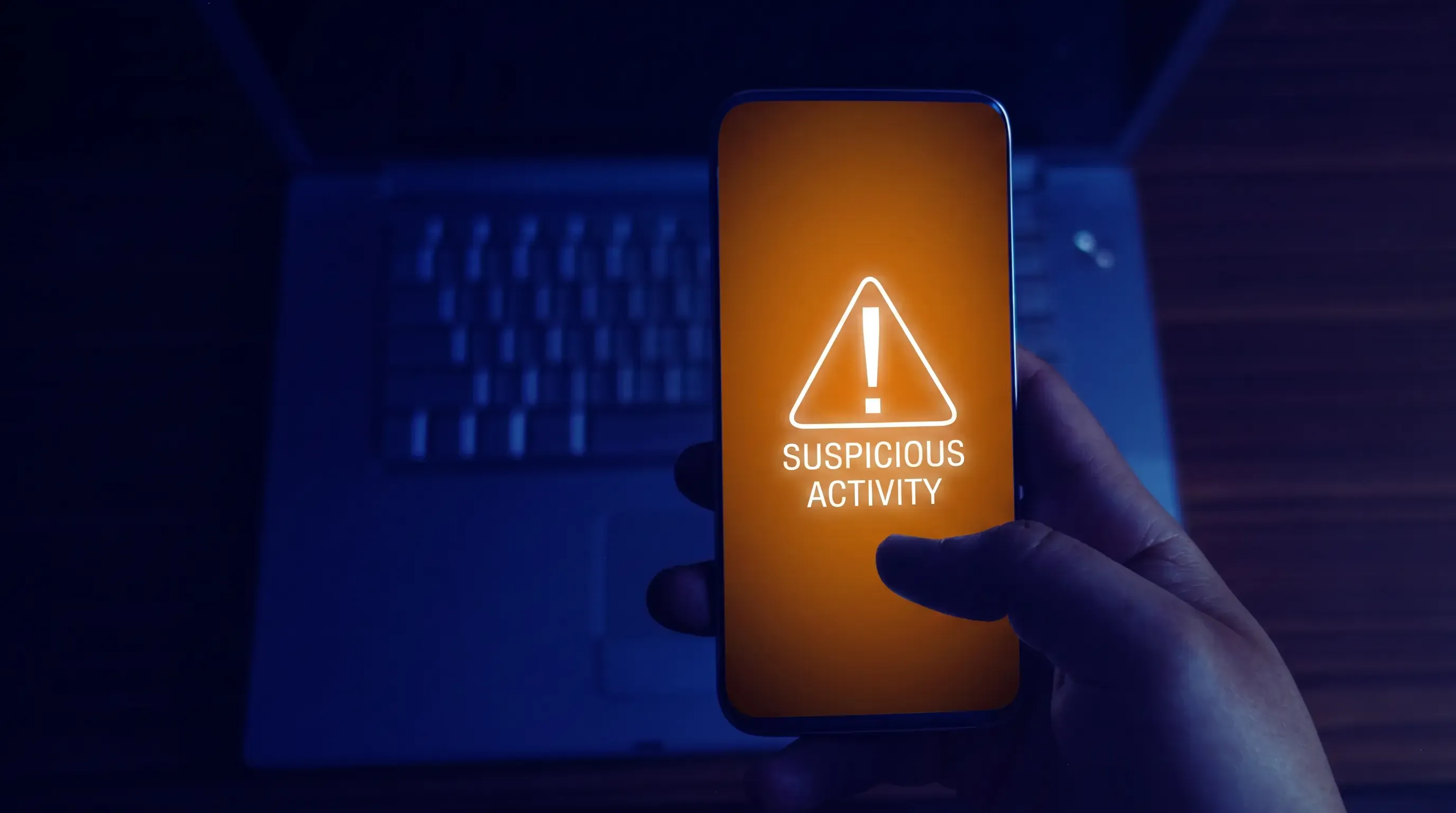 An image of a phone that has a malware warning on it