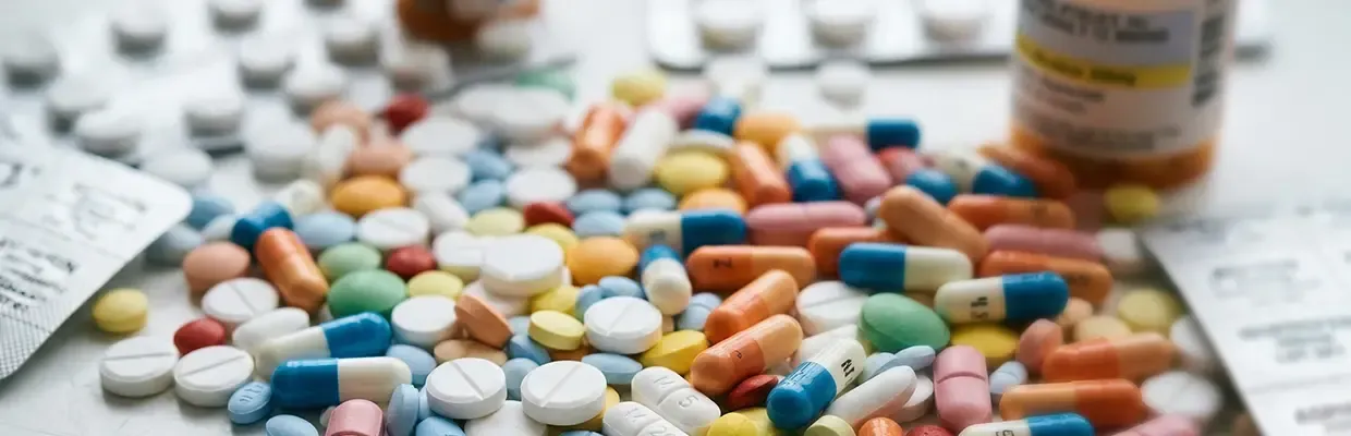 Dangerous pills laying on the table that the health organizations warn festivalgoers about