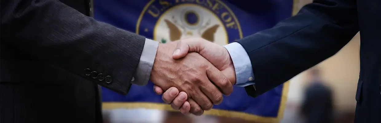 A close-up image of a handshake